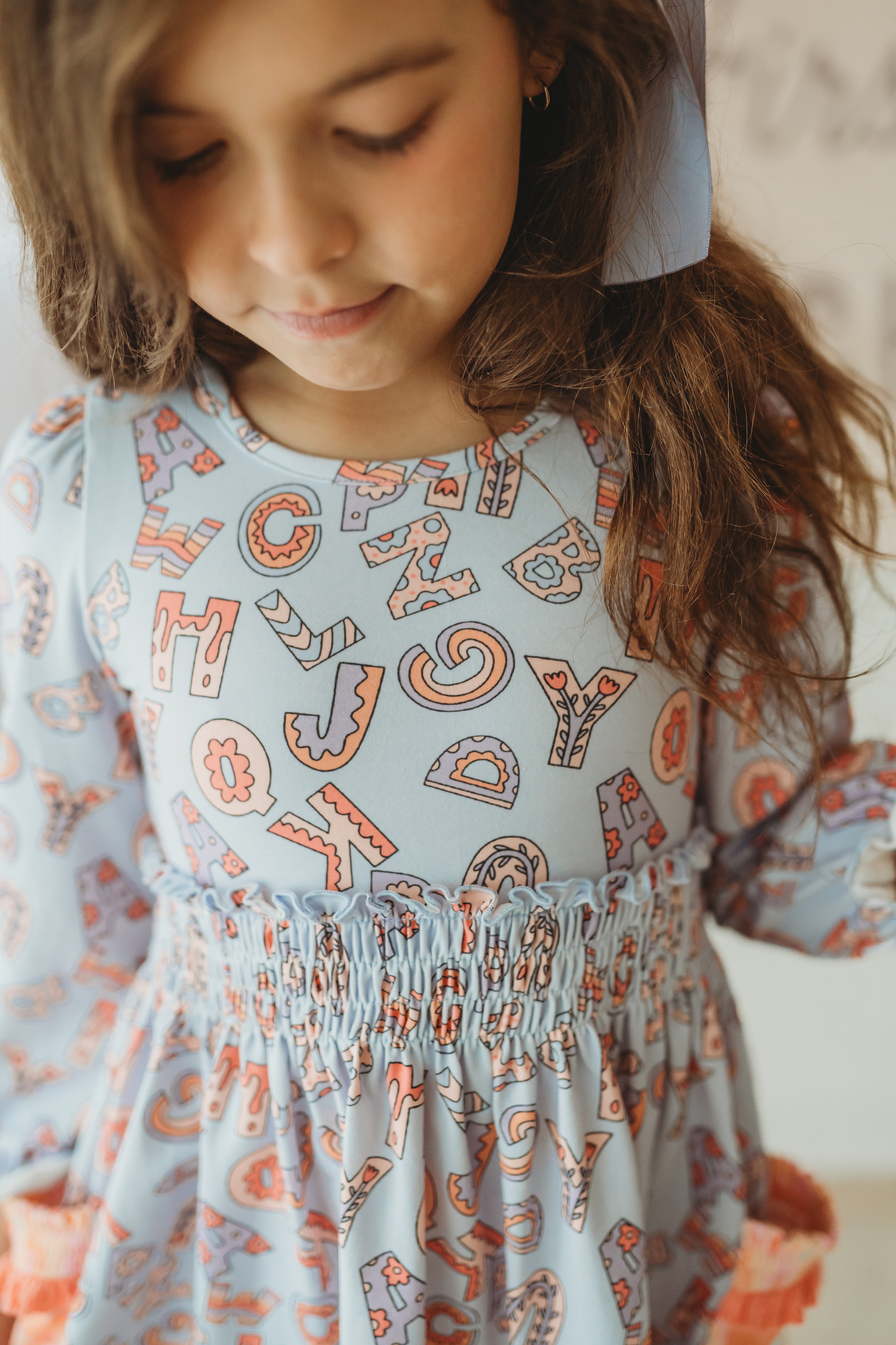 Alphabet Parade Lap Dress (Pre-Order)