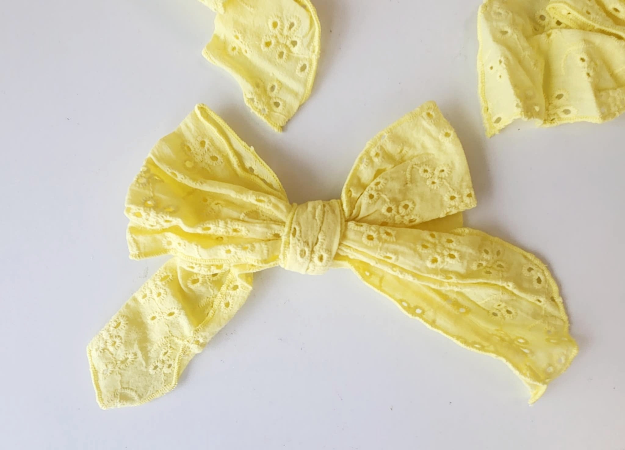 Golden Glow Eyelet Hair Bow