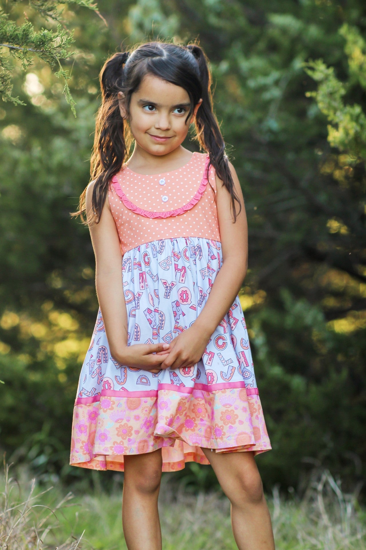 Alphabet Parade Bib Dress (Pre-Order)