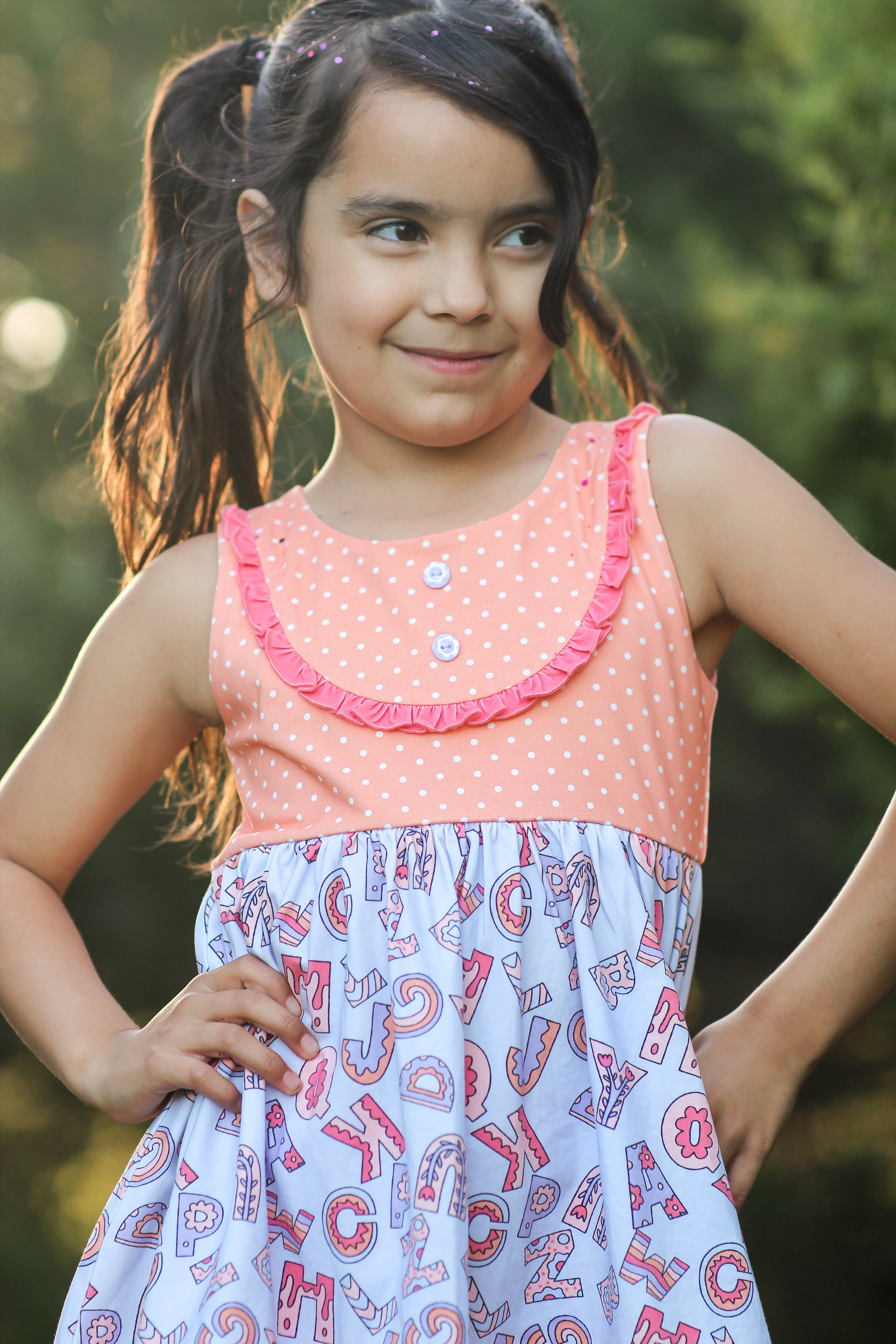 Alphabet Parade Bib Dress (Pre-Order)